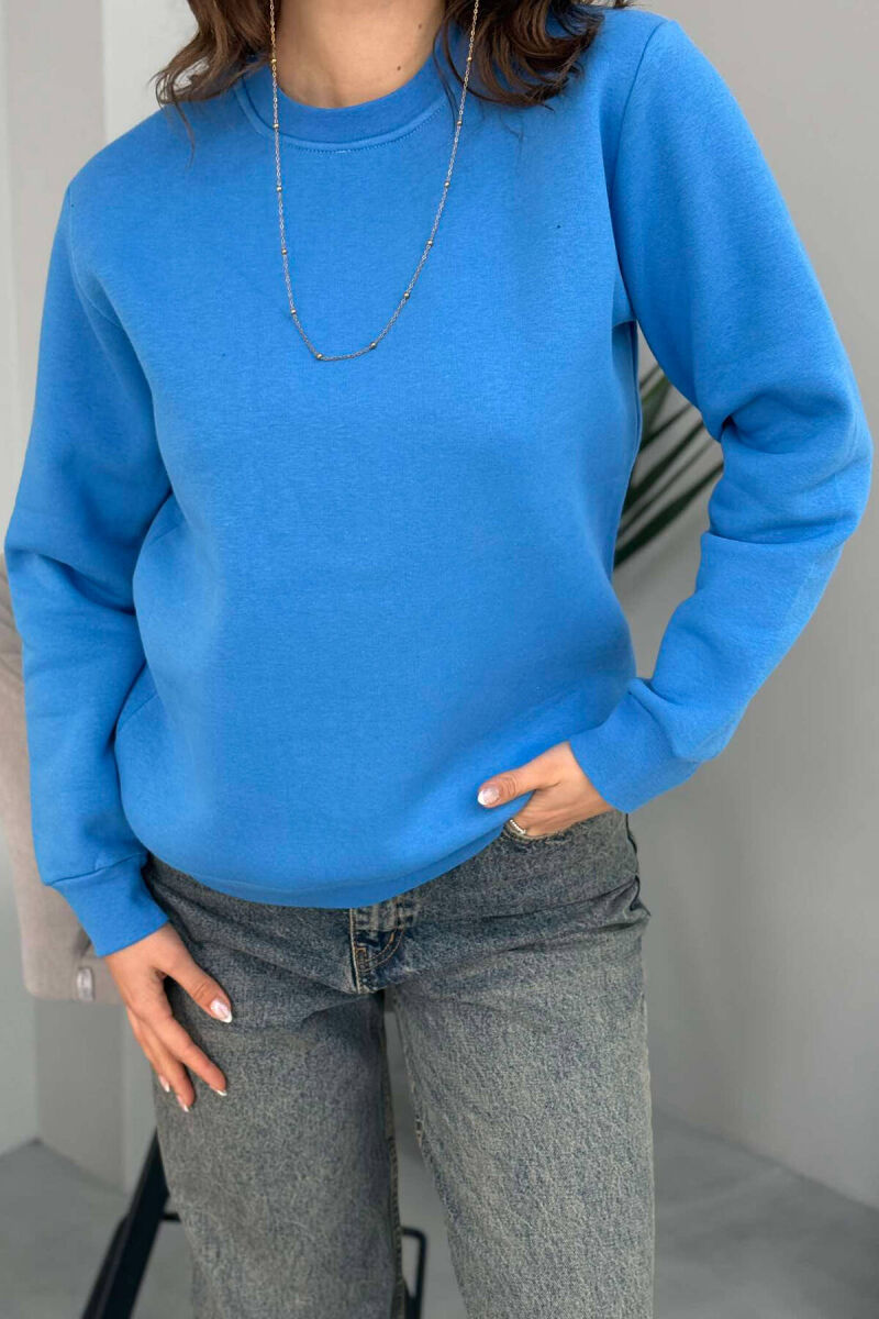 BLUZË E THJESHTË ME PUSH PËR FEMRA NË NGJYRËN BLU E ZBARDHUR - 4
