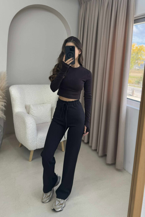 TUTA ME DIZAN ELASTIK NË BELI DHE ME LIDHËSE PËR FEMRA NË NGJYRËN E ZEZË - KLAUDIO FASHION