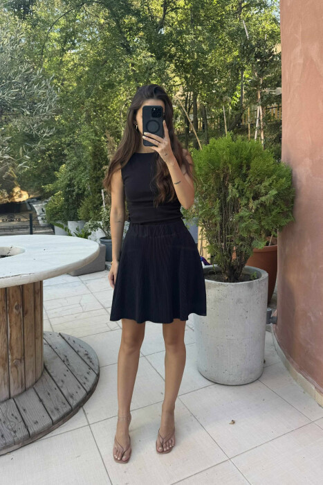 FUNDPANTALLONË NJË NGJYRËSHE ME BEL ELASTIK PËR FEMRA NË NGJYRËN E ZEZË - 7