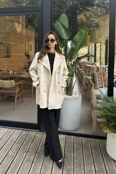 XHAKETE E THJESHTE ME DETAJIN E BUTONAVE GOLD PER FEMRA NE NGJYRE KREM - KLAUDIO FASHION