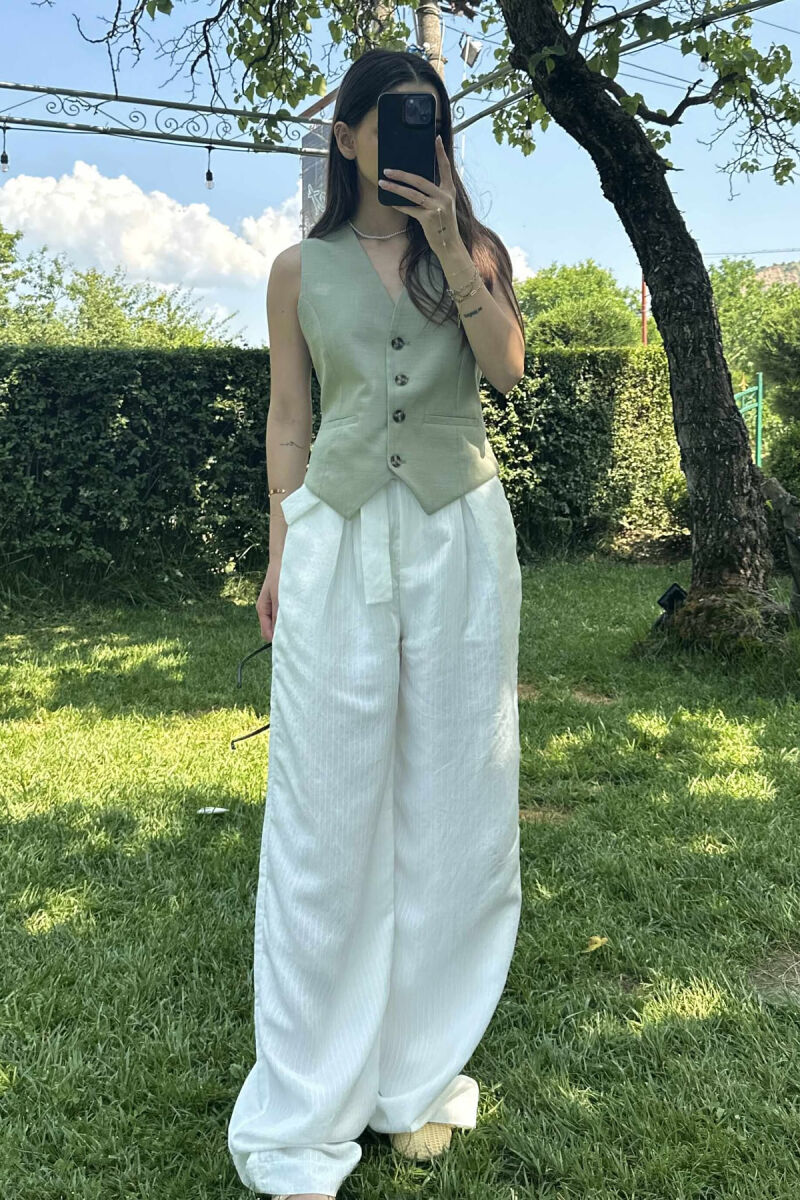JELEK NJË NGJYRËSH ME BUTONA PËR FEMRA NË NGJYRËN MENTE - 3