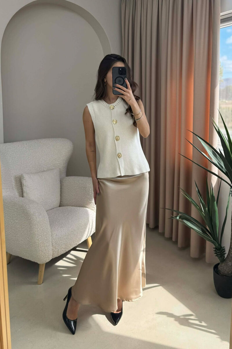 JELEK NJË NGJYRËSH ME DETAJIN E BUTONAVE PËR FEMRA NË NGJYRË KREM - 1