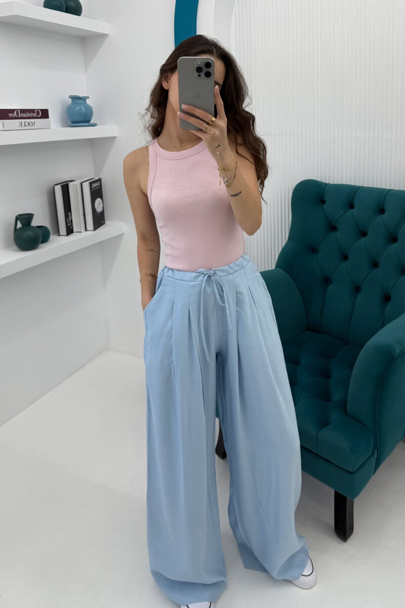 KANATIERE NJË NGJYRËSHE E THJESHTË PËR FEMRA NË NGJYRËN BABY PINK - 1