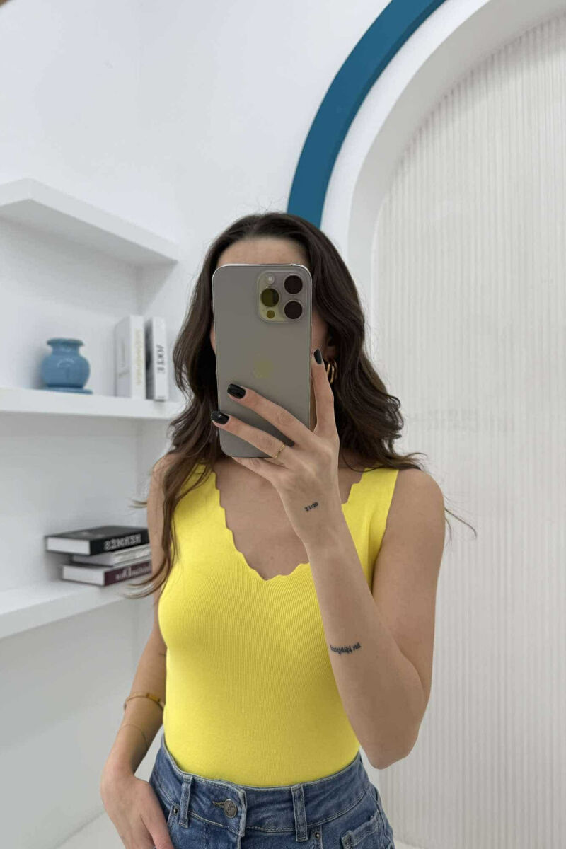 KANATJERE NJË NGJYRËSHE PËR FEMRA NË NGJYRËN E VERDHË - 1