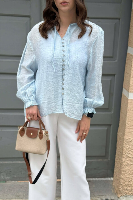 KEMISHE E THJESHTE NJE NGJYRESHE PER FEMRA NE NGJYRE BLU TE ZBARDHUR - 2