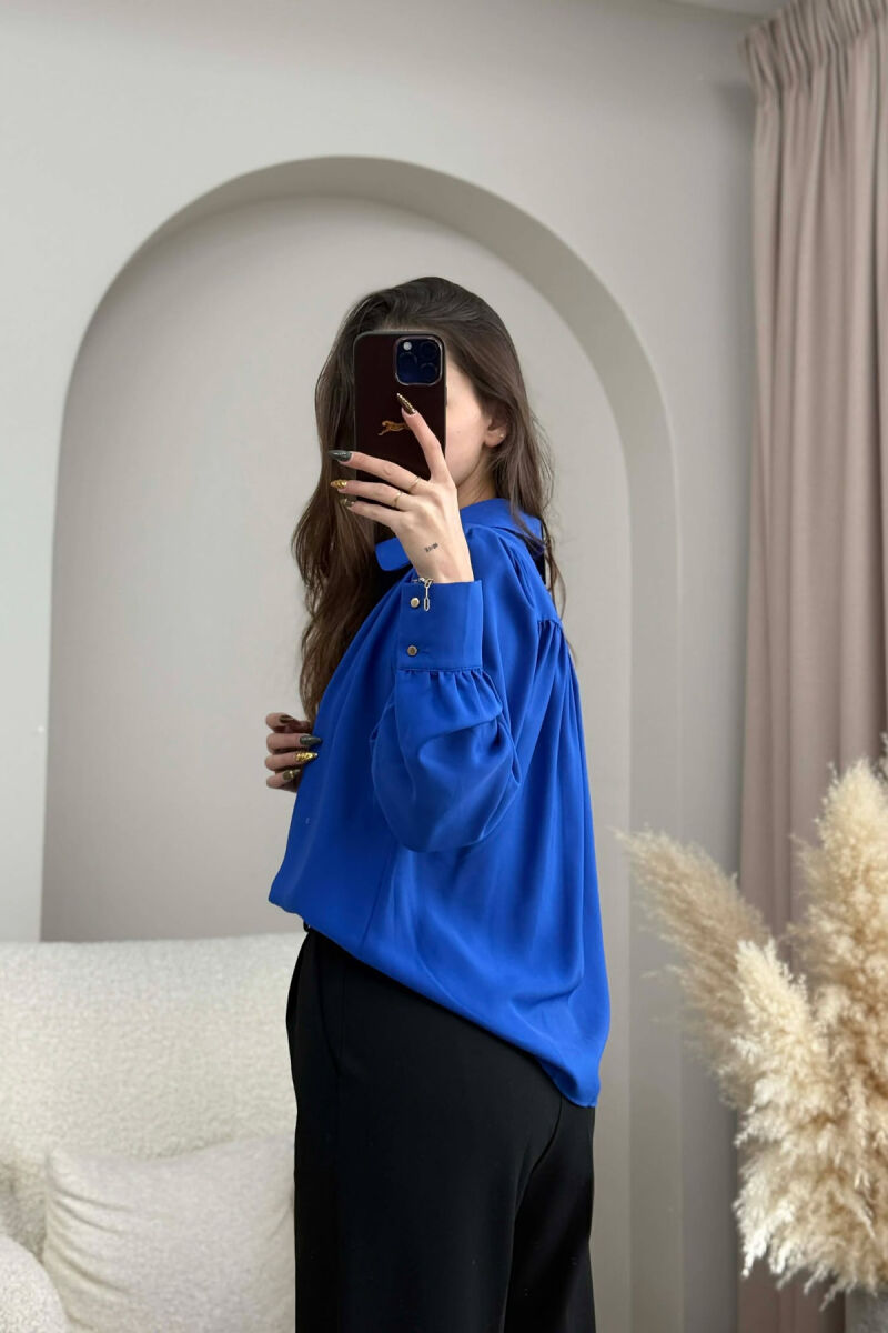 KEMISHE NJE NGJYRESHE ME BUTONA GOLD PER FEMRA NE NGJYRE BLU - 2