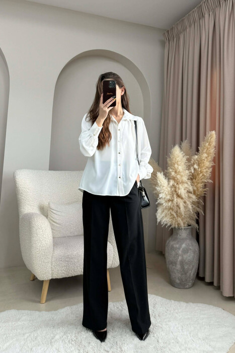 KEMISHE NJE NGJYRESHE ME BUTONA GOLD PER FEMRA NE NGJYRE TE BARDHE 