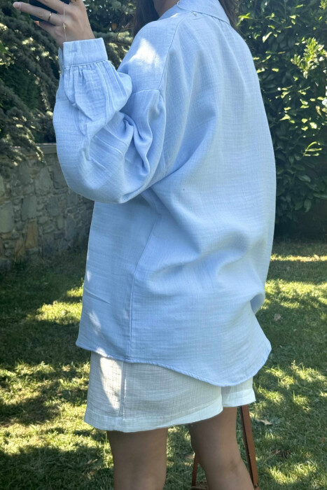 KËMISHE NJË NGJYRËSHE E THJESHTË PËR FEMRA NË NGJYRËN BLU E ZBARDHUR - 4