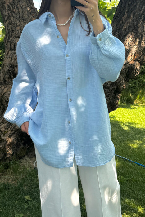 KËMISHE NJË NGJYRËSHE E THJESHTË PËR FEMRA NË NGJYRËN BLU E ZBARDHUR - 3