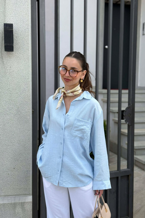 KEMISHE PER FEMRA NE NGJYRE BLU TE ZBARDHUR - 1