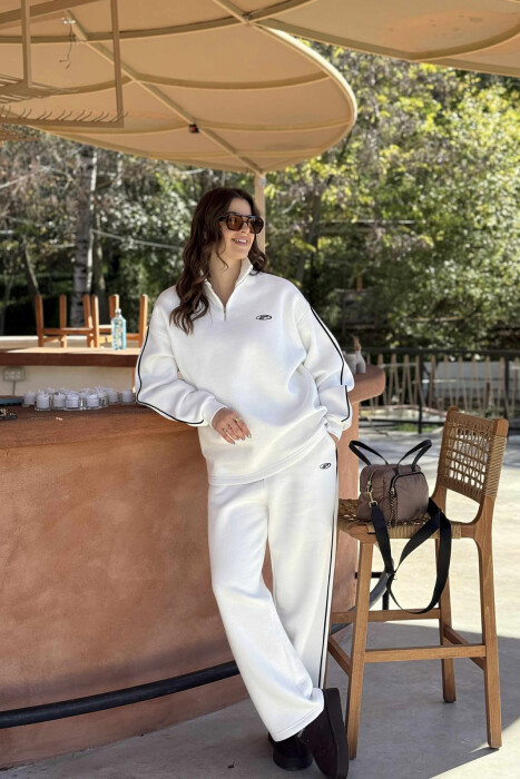 KOSTUM ME JAKË ME ZINXHIR BLUZË+PANTALLONA PËR FEMRA NË NGJYRË TË BARDHË - KLAUDIO FASHION