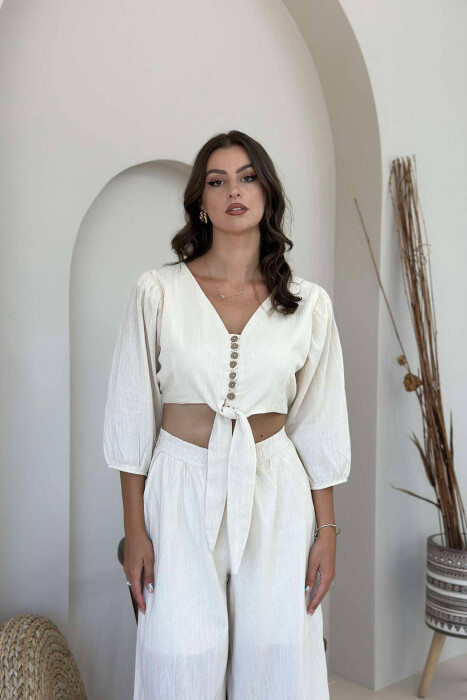 KOSTUM PËR FEMRA CROP DHE PANTALLONA NË NGJYRË KREM - 3