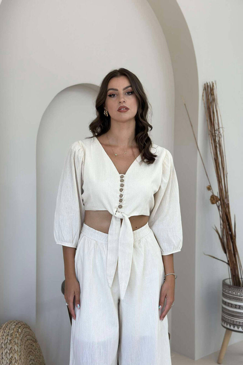KOSTUM PËR FEMRA CROP DHE PANTALLONA NË NGJYRË KREM - 3