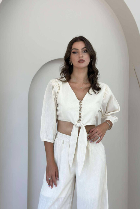 KOSTUM PËR FEMRA CROP DHE PANTALLONA NË NGJYRË KREM - 5