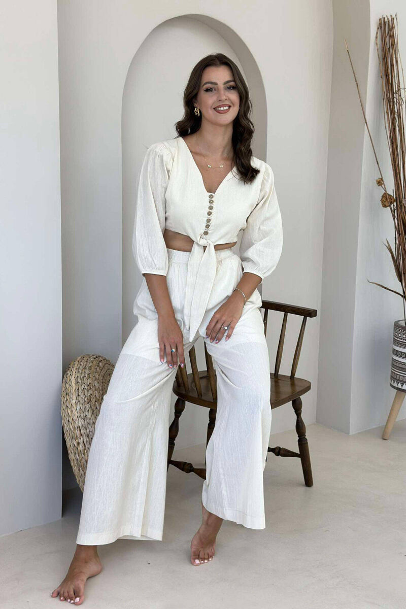 KOSTUM PËR FEMRA CROP DHE PANTALLONA NË NGJYRË KREM - 7