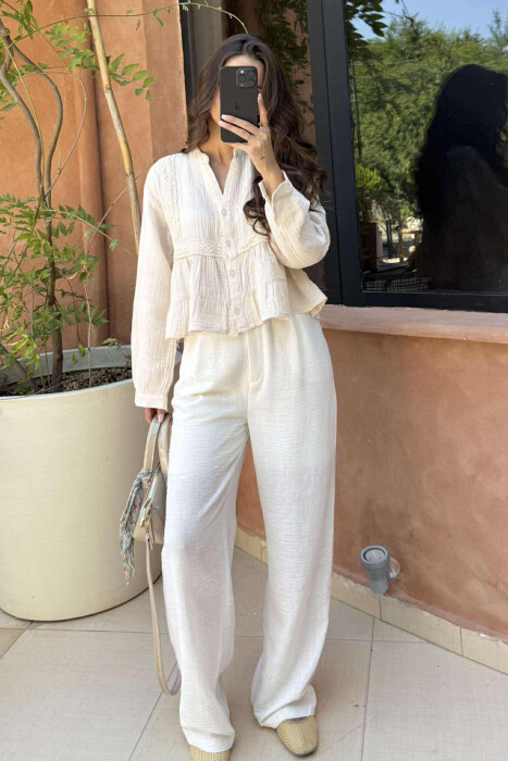 KËMISHË NJË NGJYRËSHE PËR FEMRA NË NGJYRËN KREM 