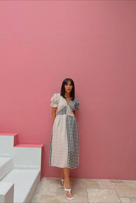 FUSTAN ME DEKOLTE V PËR FEMRA NË NGJYRËN BEZHË TË ZBARDHUR ME TË ZEZË - KLAUDIO FASHION