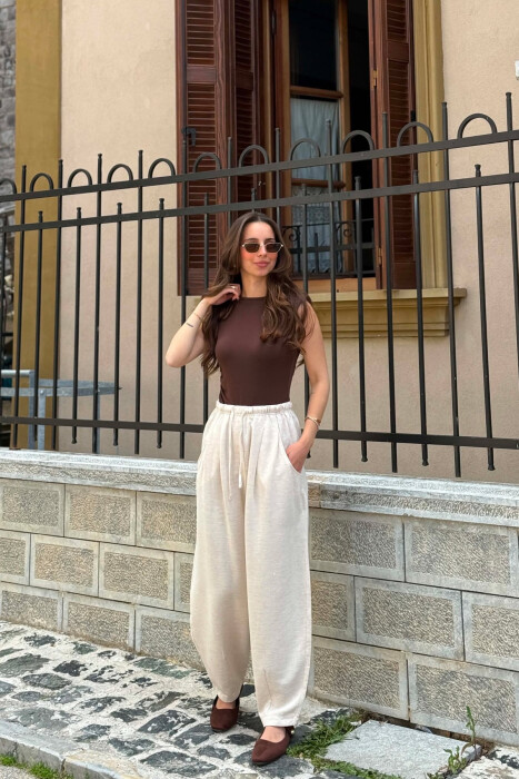 PANTALLONA ME BEL ELASTIK PER FEMRA NE NGJYRE KREM - KLAUDIO FASHION