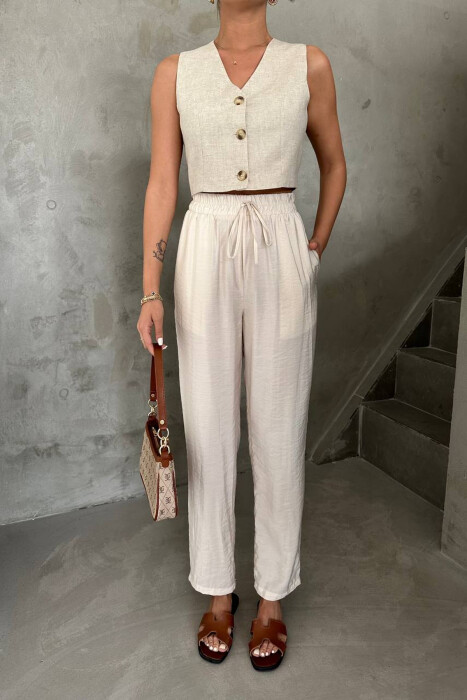 PANTALLONA NJE NGJYRESHE ME BEL ELASTIK PER FEMRA NE NGJYRE KREM - KLAUDIO FASHION