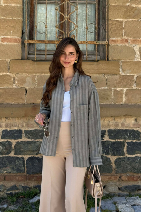 KEMISHE NJE NGJYRESHE ME XHEP NE PJESEN PARA PER FEMRA NE NGJYRE JESHILE TE ZBARDHUR 