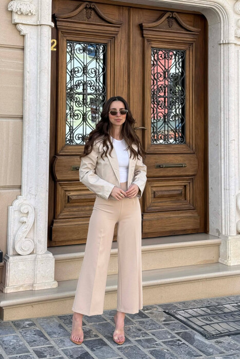 XHAKETE LEKURE E THJESHTE NJE NGJYRESHE PER FEMRA NE NGJYRE BEZHE - KLAUDIO FASHION