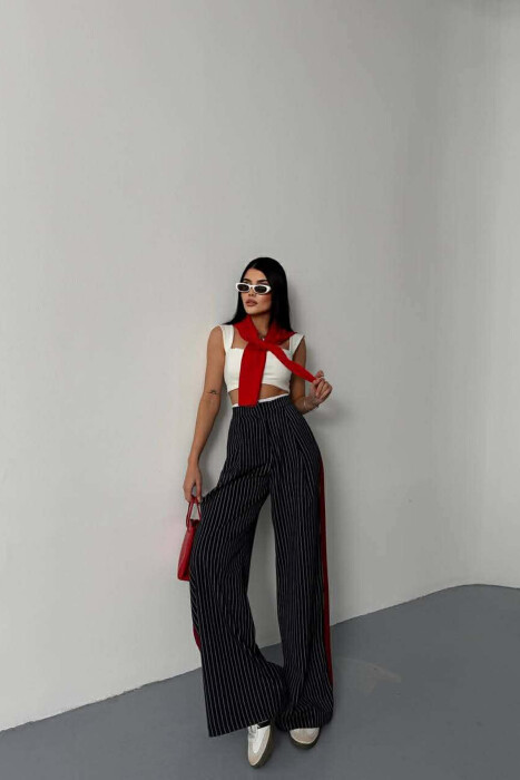 PANTALLONA TE GJERA NJE NGJYRESHE ME DIZAJN ME VIJA PER FEMRA NE NGJYRE BLU TE ERRET - KLAUDIO FASHION