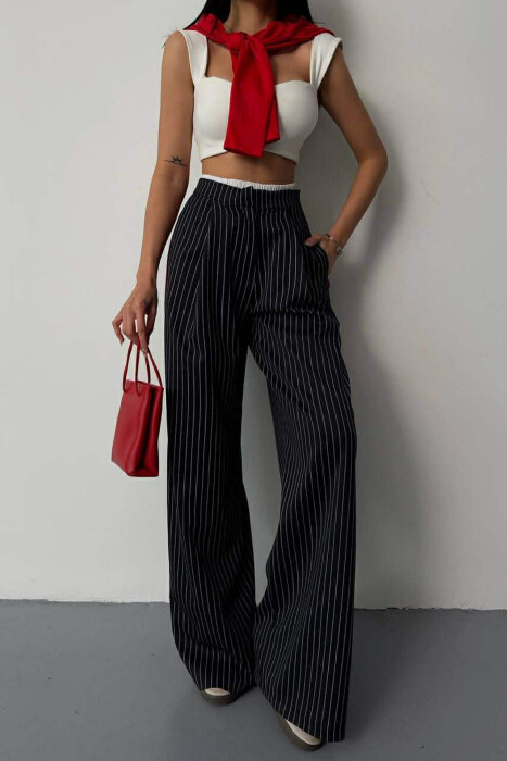 PANTALLONA TE GJERA NJE NGJYRESHE ME DIZAJN ME VIJA PER FEMRA NE NGJYRE BLU TE ERRET - KLAUDIO FASHION