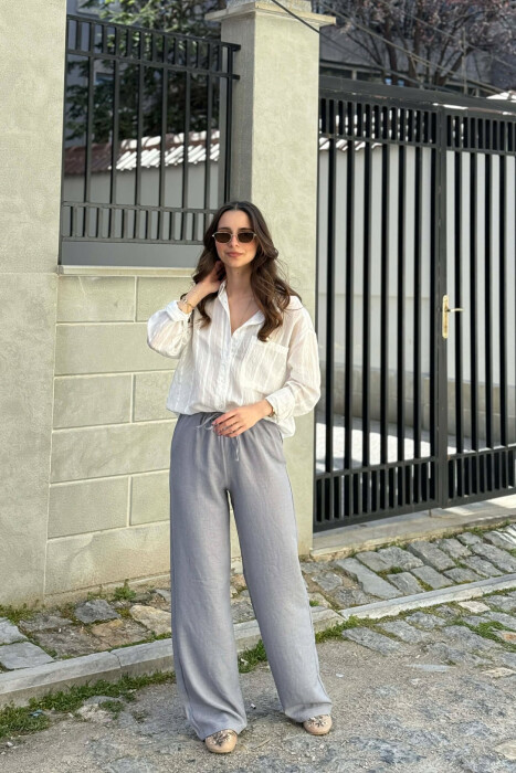 PANTALLONA ME BEL ELASTIK DHE ME DETAJIN E LIDHSEVE PER FEMRA NE NGJYRE GRI HIRI - 2