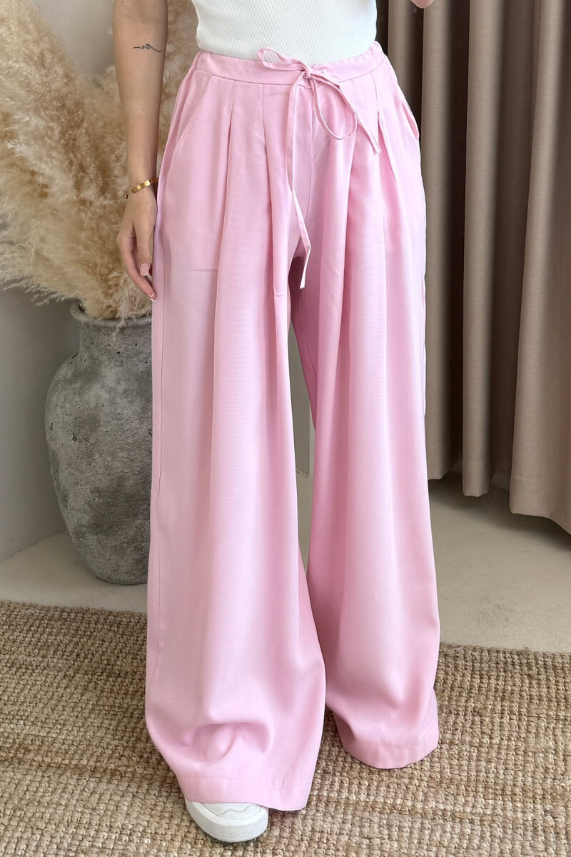 PANTALLONA ME DETAJIN E LIDHSES ME BEL GJYSMË ELASTIK PËR FEMRA NË NGJYRËN BABY PINK - 3