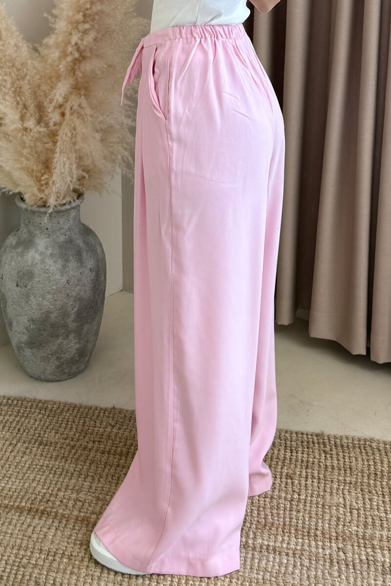 PANTALLONA ME DETAJIN E LIDHSES ME BEL GJYSMË ELASTIK PËR FEMRA NË NGJYRËN BABY PINK - 4