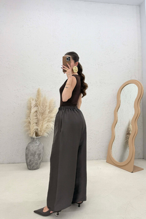 PANTALLONA ME SHKELQIM PER FEMRA NE NGJYRE JESHILE TE ERRET - 4