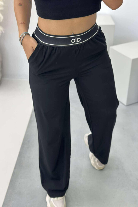 PANTALLONA ME SHKRIM ALO ELASTIKE NË BELI PËR FEMRA NË NGJYRËN E ZEZË - 3