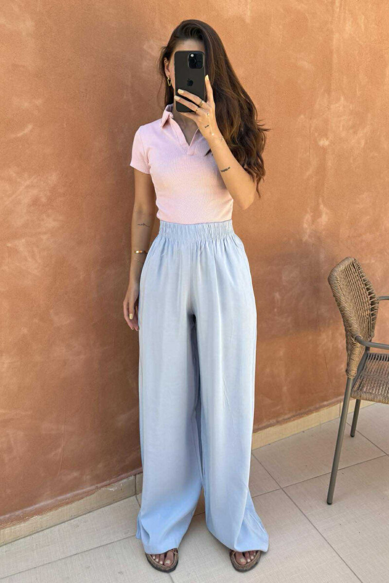 PANTALLONA NJË NGJYRËSHE TË THJESHTA PËR FEMRA NË NGJYRËN BABY BLUE - 1