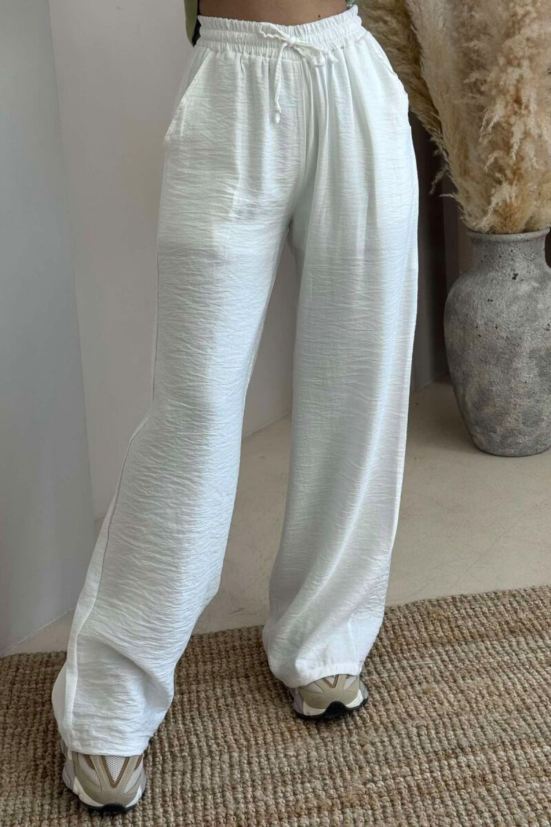 PANTALLONA NJËNGJYRËSHE ELASTIKE NË BELI PËR FEMRA NË NGJYRË TE BARDHE - 3