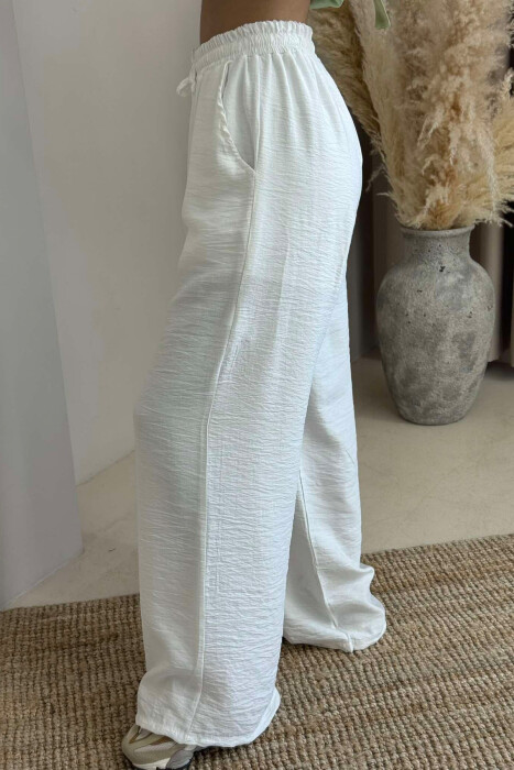 PANTALLONA NJËNGJYRËSHE ELASTIKE NË BELI PËR FEMRA NË NGJYRË TE BARDHE - 4