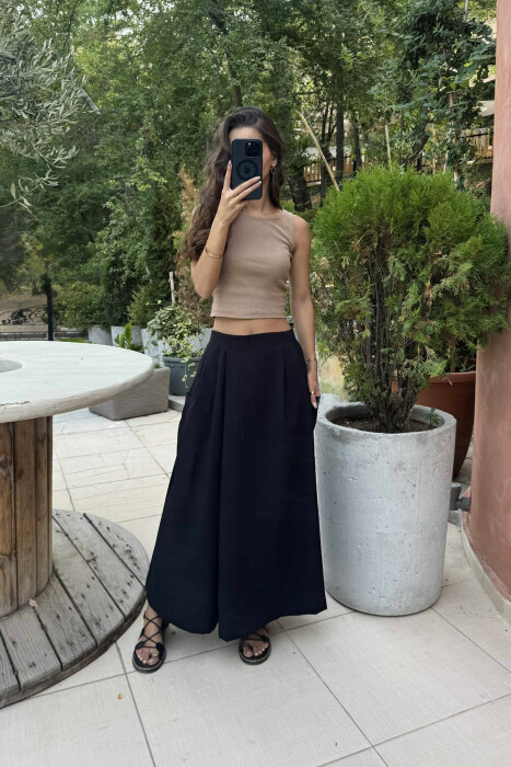 PANTALLONA TË GJERA ME DETAJIN E XHEPIT PËR FEMRA NË NGJYRËN E ZEZË - 2