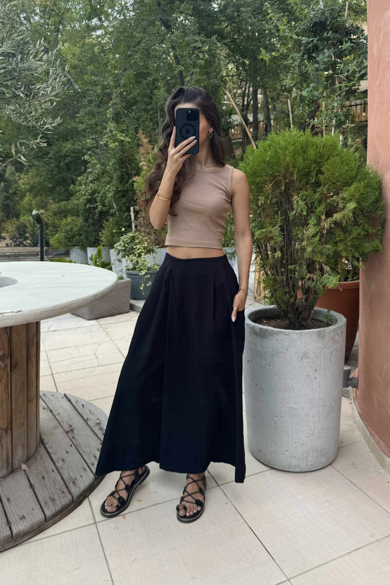 PANTALLONA TË GJERA ME DETAJIN E XHEPIT PËR FEMRA NË NGJYRËN E ZEZË - 1