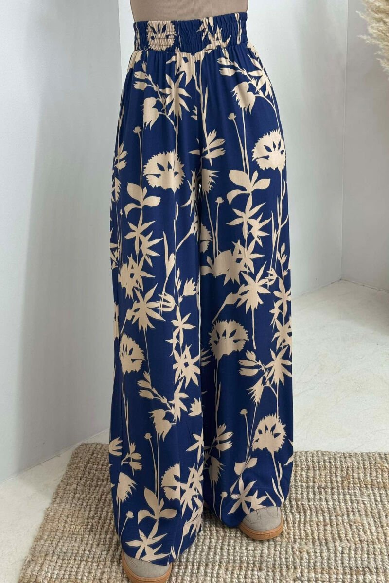 PANTALLONA TË GJERA ME DIZAJNE TË NDRYSHME PËR FEMRA NË NGJYRËN BLU - 2