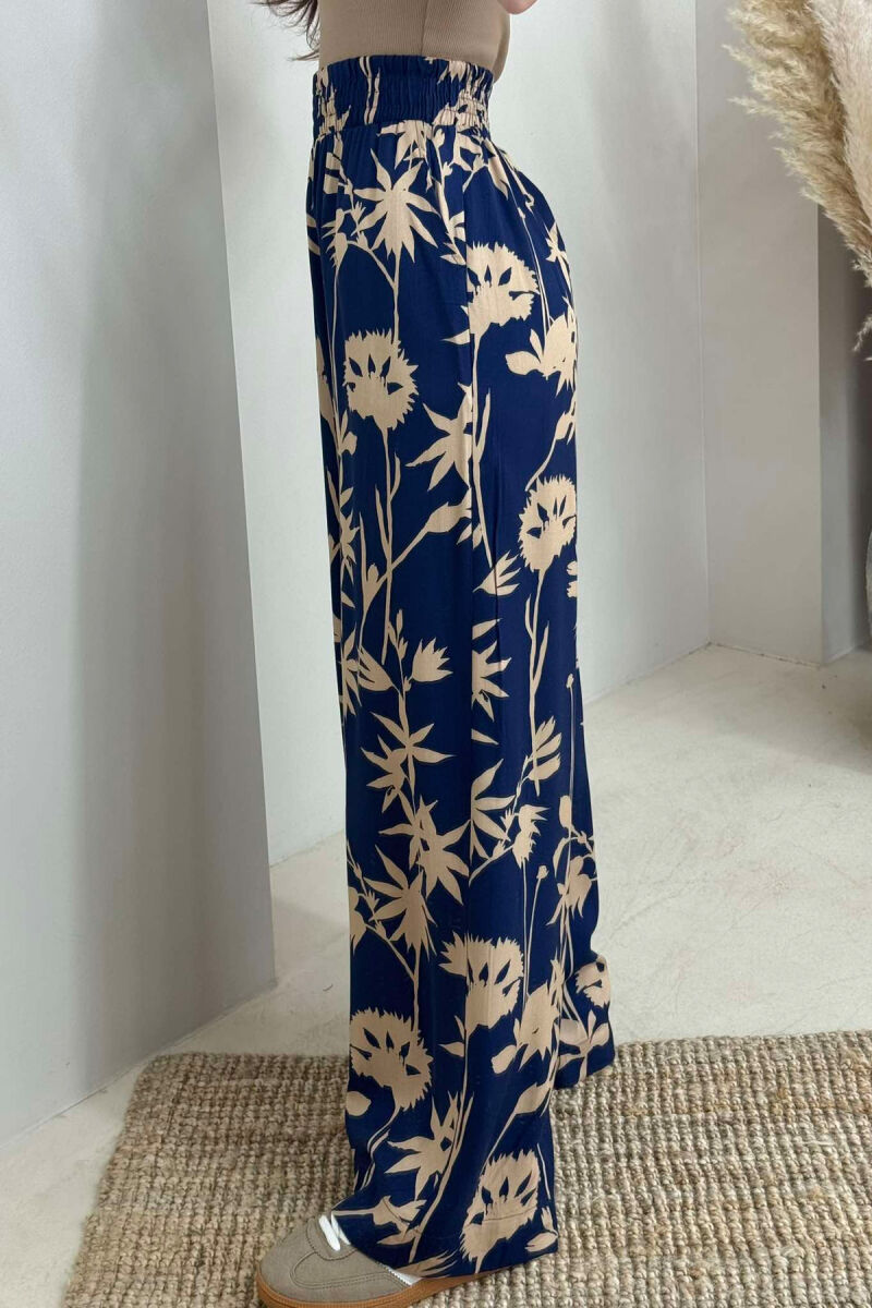 PANTALLONA TË GJERA ME DIZAJNE TË NDRYSHME PËR FEMRA NË NGJYRËN BLU - 3