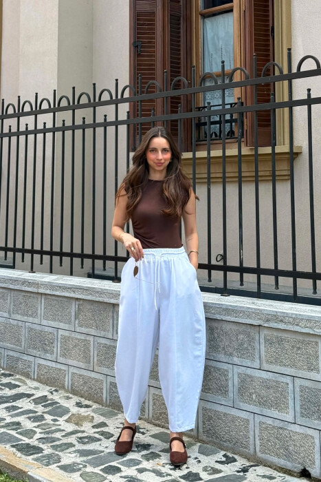 PANTALLONA TE GJERA NJE NGJYRESHE PER FEMRA NE NGJYRE TE BARDHE - KLAUDIO FASHION