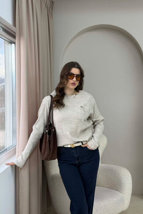 TRIKO ME NJË XHEP PËR FEMRA NË NGJYRËN BEZHË 