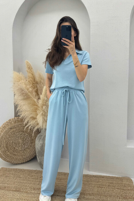 SET NJË NGJYRËSH T-SHIRT+TUTA PËR FEMRA NË NGJYRËN BLU E ZBARDHUR 