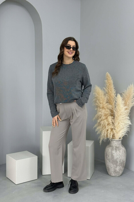 TRIKO ME JAKË TË RRUMBULLAKËT DHE ME NJË XHEP PËR FEMRA NË NGJYRËN BLU - KLAUDIO FASHION