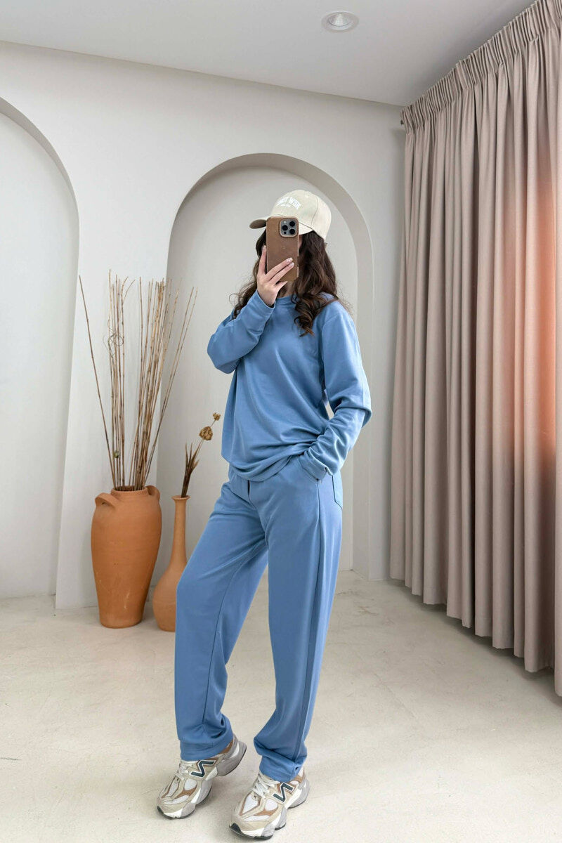 SET NJE NGJYRESH BLUZE + TUTA PER FEMRA NE NGJYRE BLU TE ZBARDHUR - 1