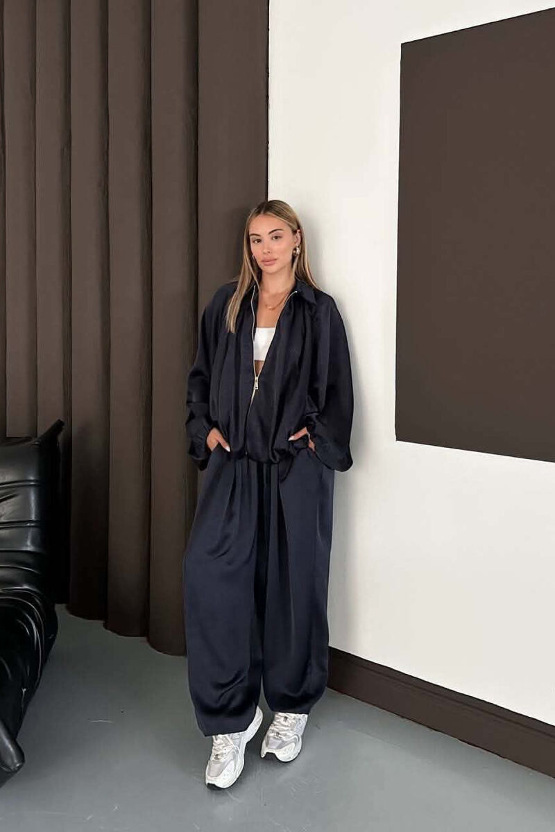 SET NJE NGJYRESH ME SHKELQIM XHAKETE + PANTALONA TE GJERA PER FEMRA NE NGJYRE BLU - 1