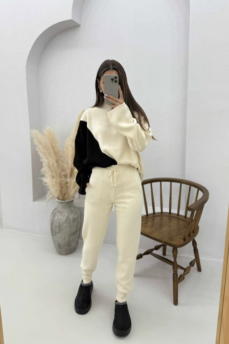 SET TRIKO ME JAKË GJYSËM GOLF+PANTALLONA PËR FEMRA NË NGJYRË KREM ME TË ZEZË - 1