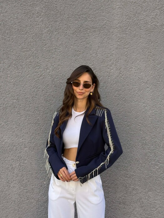 XHAKETE E SHKURTER ME DETAJIN E GUREVE TE SHNDRITSHEM PER FEMRA NE NGJYRE BLU TE ERRET - KLAUDIO FASHION