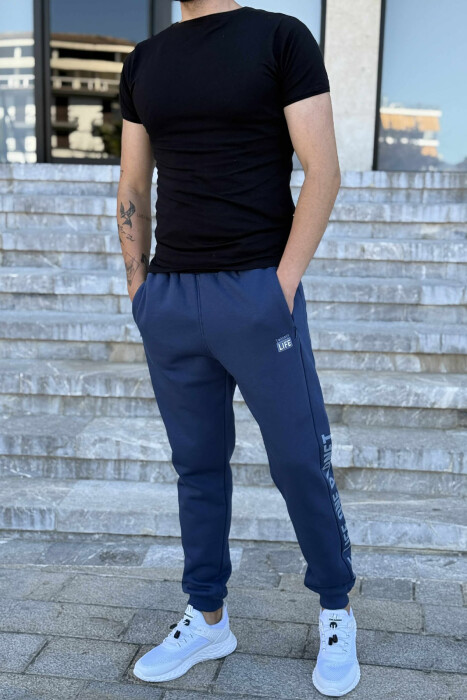 TUTA ME PUSH DHE SHKRIM ANASH PËR MESHKUJ NË NGJYRËN BLU 