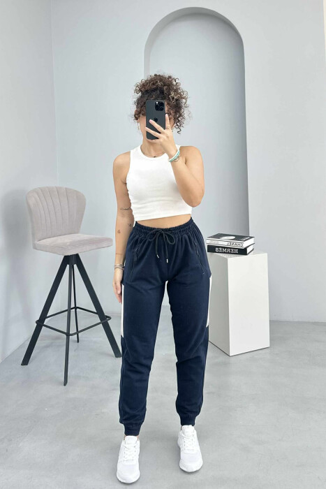 TUTA ME VIJA PËR FEMRA NË NGJYRËN BLU E ERRËT - KLAUDIO FASHION