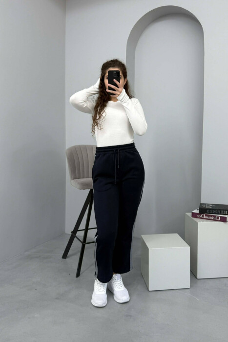 TUTA NJË NGJYRËSHE ME PUSH DHE VIJA PËR FEMRA NË NGJYRË BLU TË ERRËT - KLAUDIO FASHION